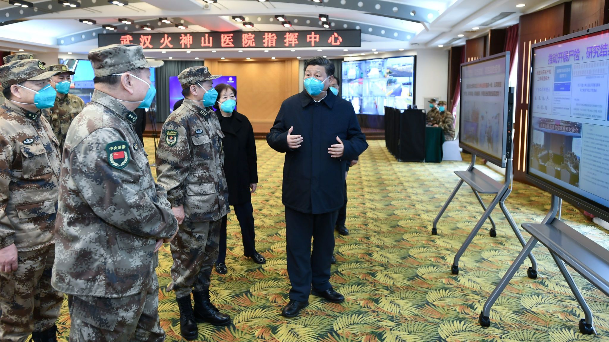 President Xi Jinping learns about a hospital's infection treatment processes in Wuhan